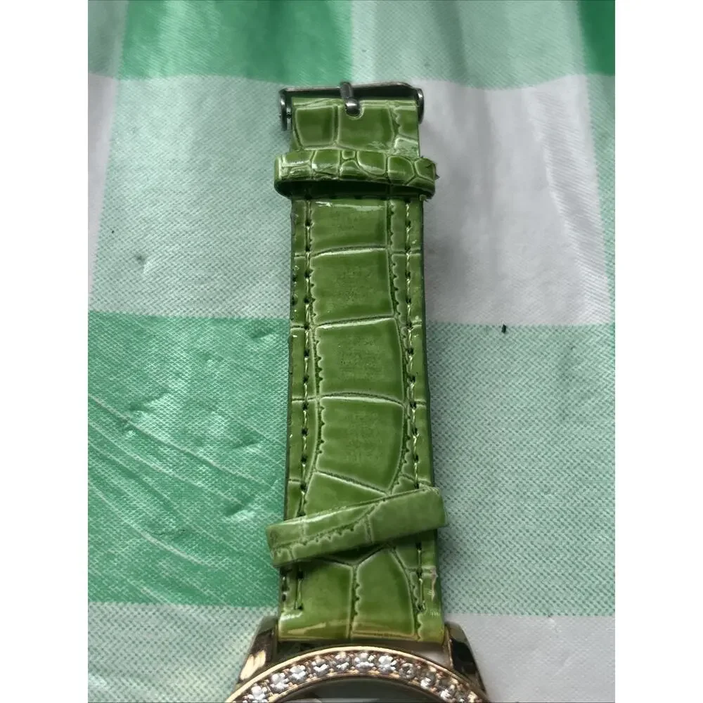Women’s Rose Gold Tone Butterfly Dial Quartz Watch